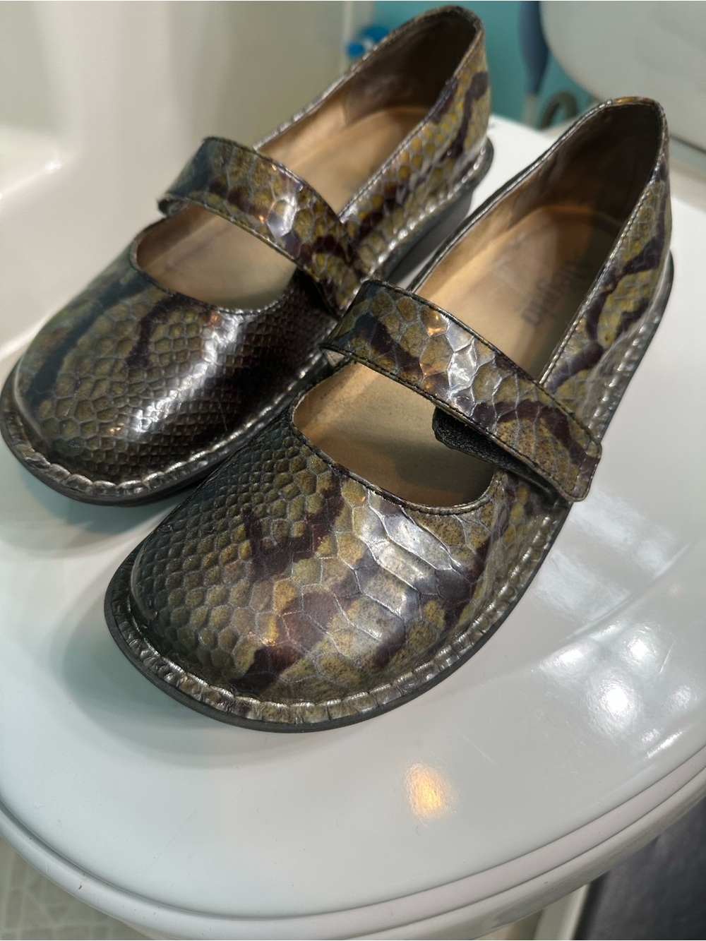 Alegria Snake-Print Mary Janes in Olive, Brown and Gold